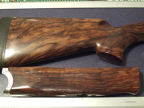 The wood has alot of figure if you wanted to refinish. . K80 forend